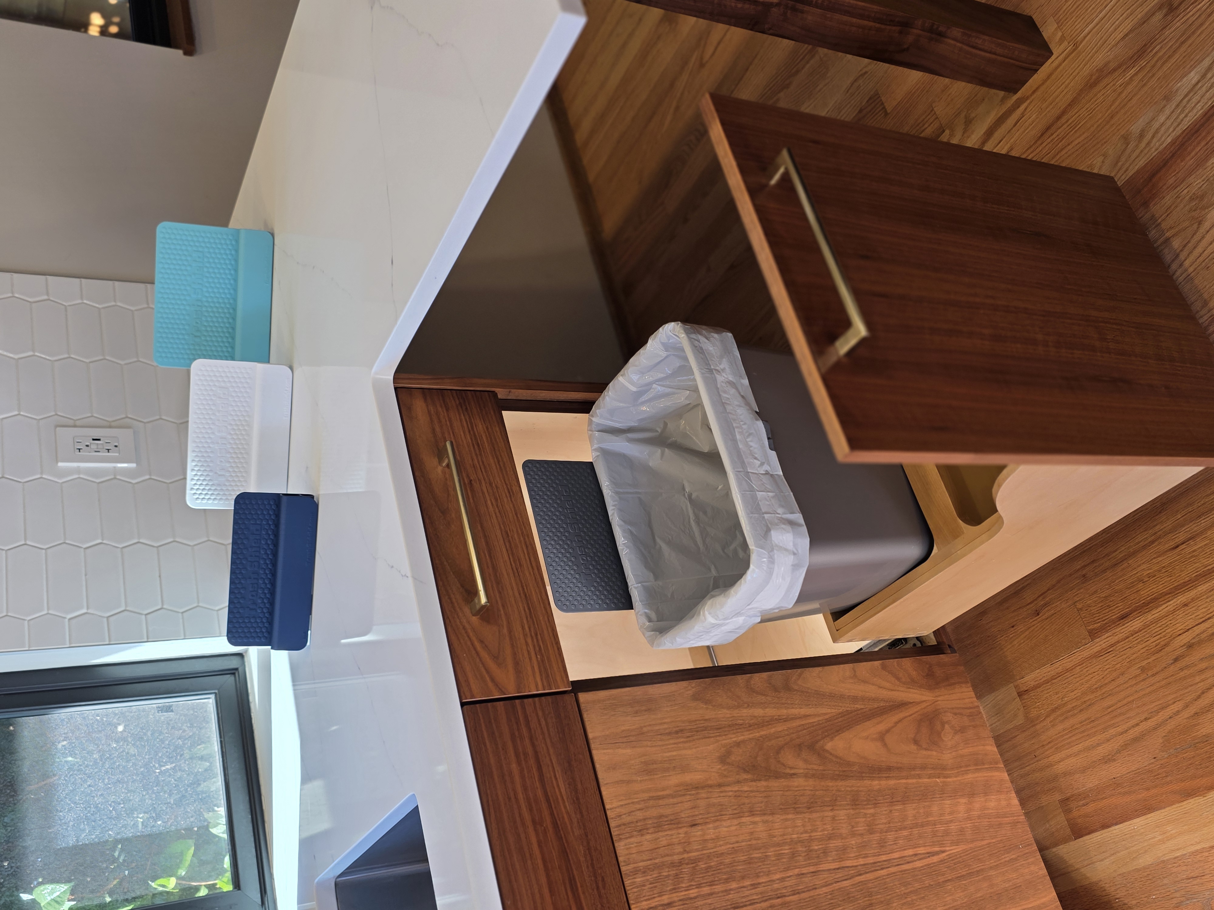 Trash Shield installed cleanly on a pull-out trash cabinet